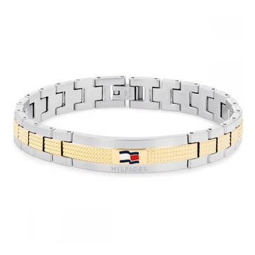 Ανδρικό ατσάλινο βραχιόλι Tommy Hilfiger 2790642 χειροπέδα δίχρωμο σε ασημένιο χρώμα με χρυσές λεπτομέρεις και σχέδιο μπρασελέ.